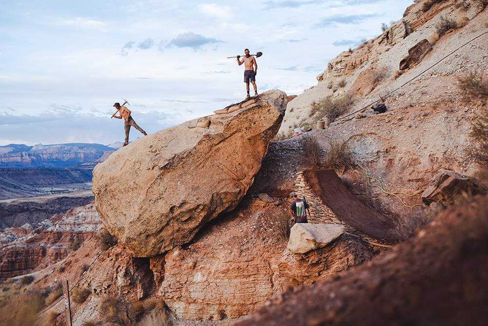 A wide angle image of Brendog's team building a massive rock feature