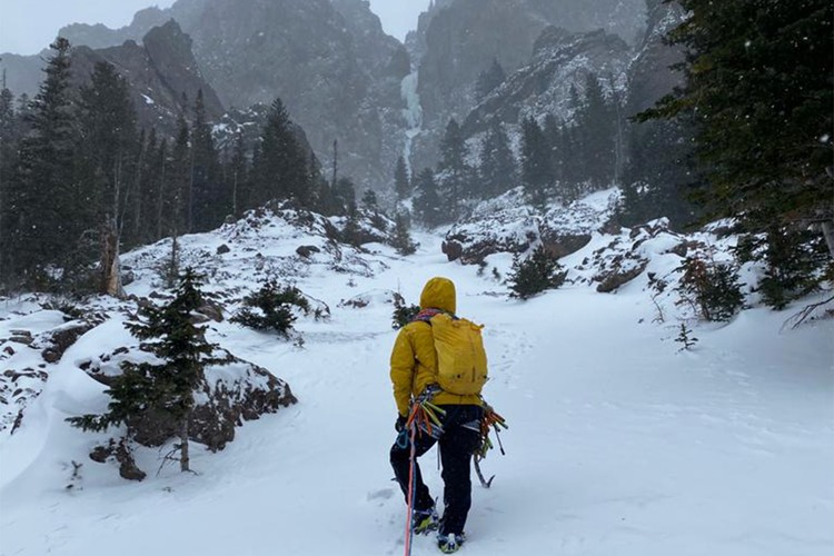 Helias walking on the snow to reach the icefalls