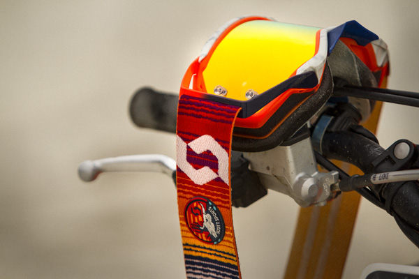 close up of the mojave prospect goggle hanging on a motorcyle handlebar