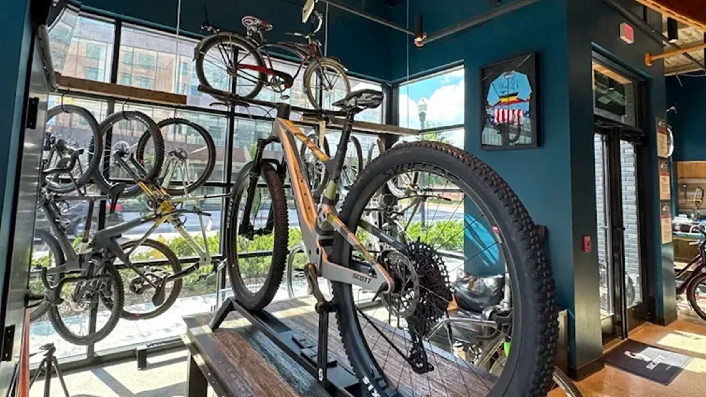 The interior of SCOTT Adventure Lab featuring a fleet of SCOTT bikes