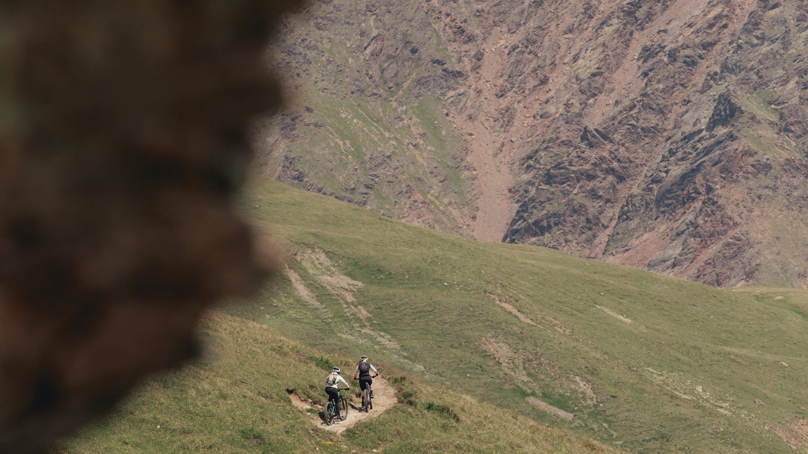 Two women mountain biking