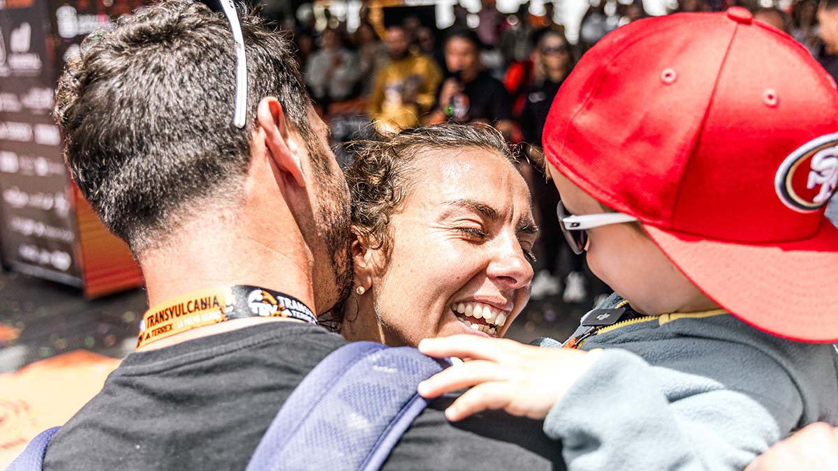 Anne-Lise celebrates with her family at the finish line. Photos by Cyrille Quintard