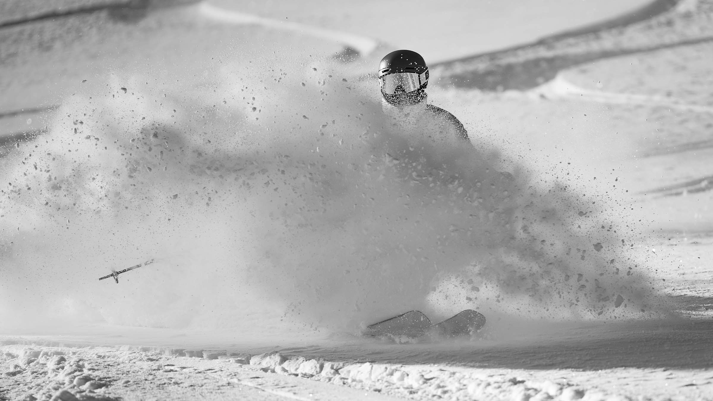 Wynter McBride in a spray of powder at Snowbasin Resort.
